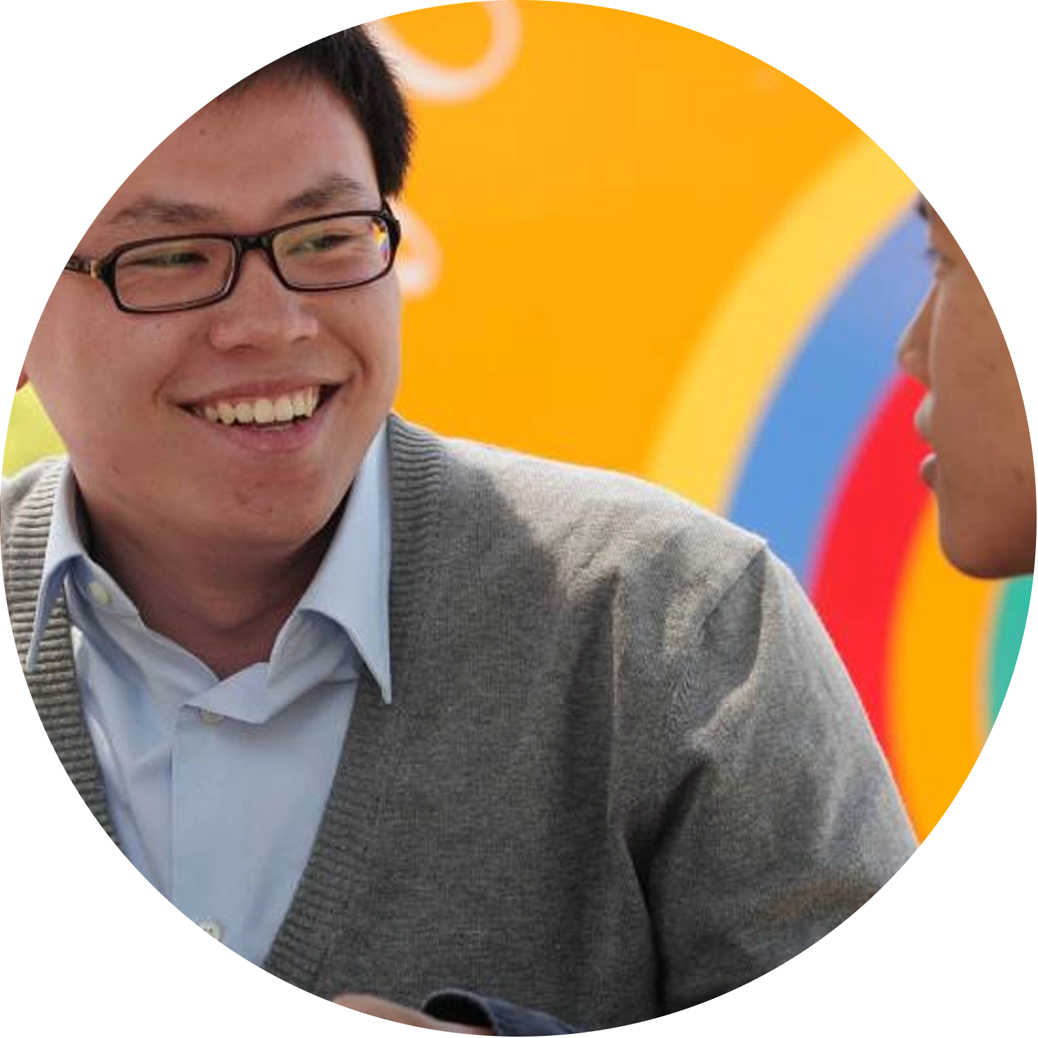 College of Business International Student Smiling while engaging with another student