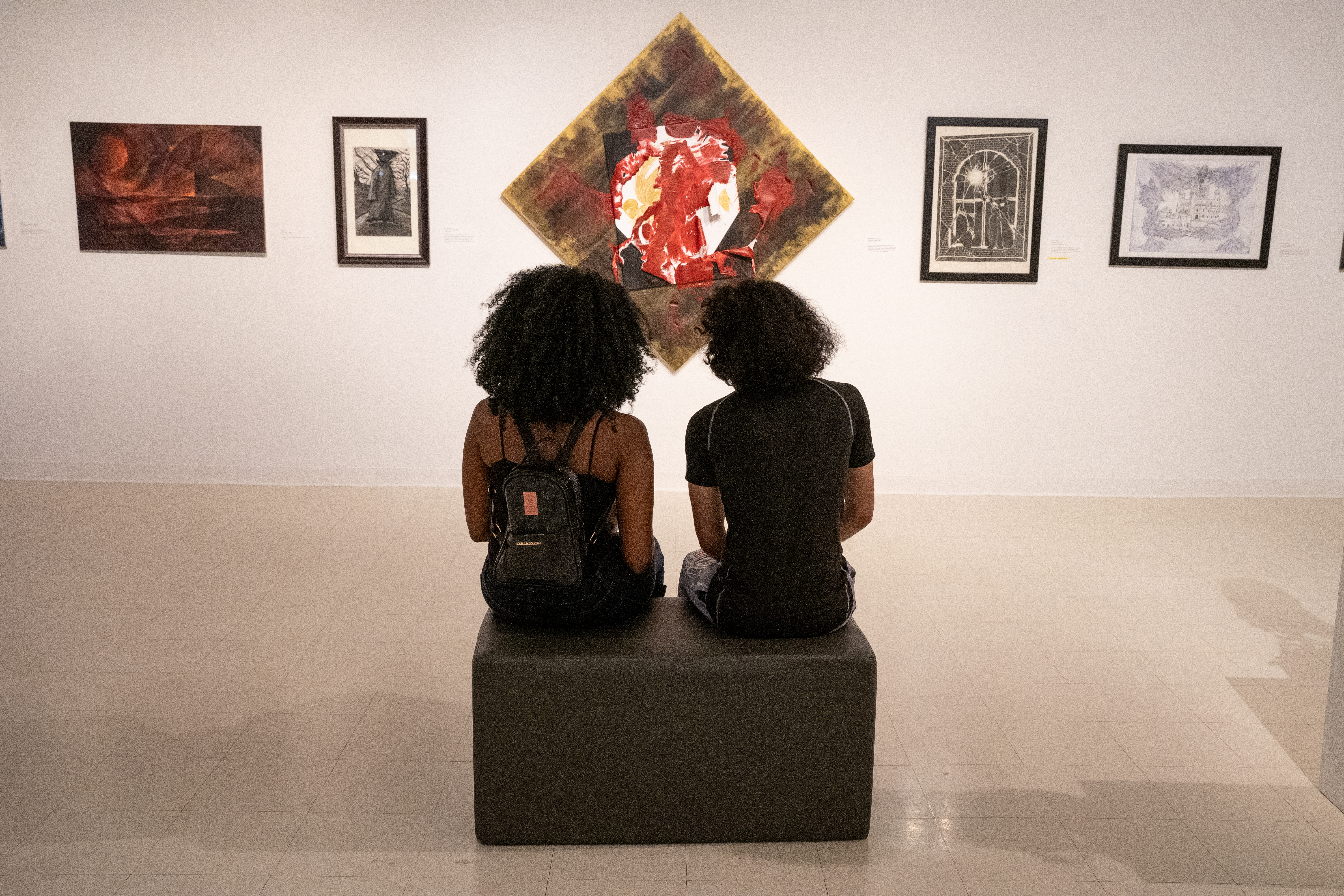 students looking at art