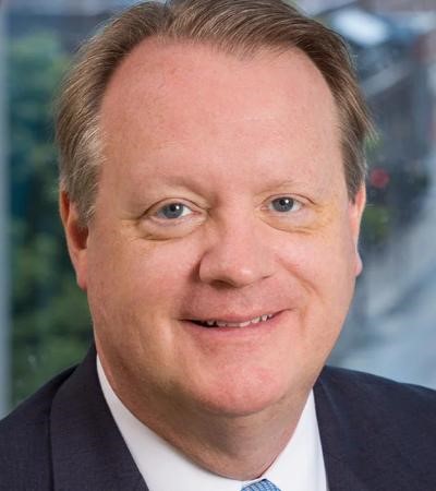 Headshot of Gregory Butler, Executive Vice President and General Counsel of Eversource Energy 